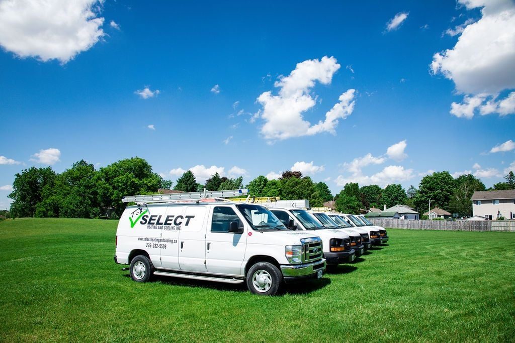 The Select Heating and Cooling service vans